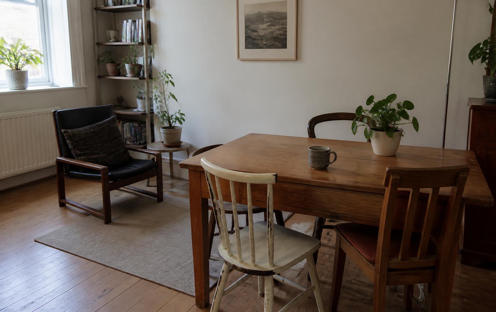 Shared dining space with a wooden table
